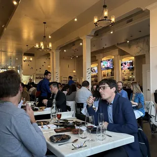 The restaurant was buzzing around 7:45 pm