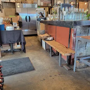 a kitchen with a counter and a bar