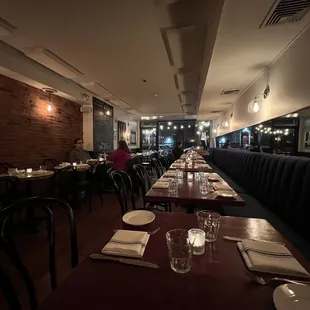 a restaurant with tables and chairs