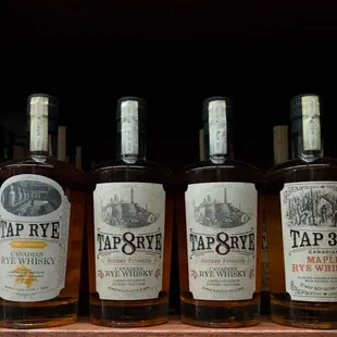 a row of bottles of wine