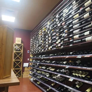 Our fully stocked, temperature controlled wine room.
