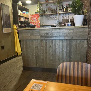 a table and chairs in a restaurant