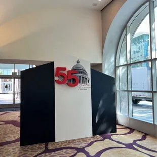 Photo op Backdrop for 55th Company Anniversary Celebration Backdrop is a rental and design and execution of clients vision.