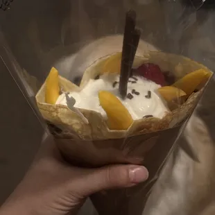 Wrapped my crepe to go. Raspberry mango crepe