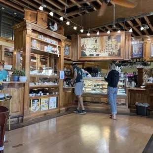 customers at the counter of a cafe