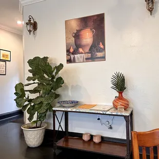a table with a potted plant on it