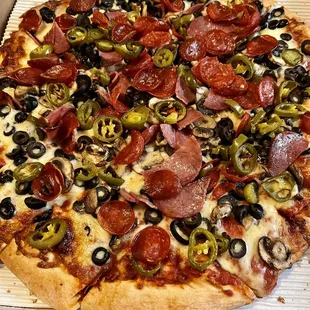 Pepperoni, salami, jalapeño, olives