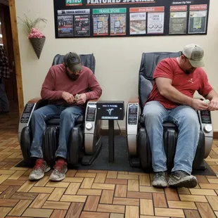Two studs trying to get these massage chairs working