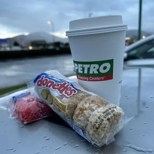 a cup of coffee and a snack