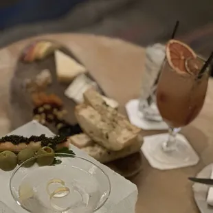 Phenomenal martini, cocktail, and cheese plate.  Delicious! The caviar cigar? Chef's  kiss!