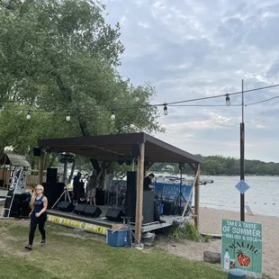 a woman standing on the beach