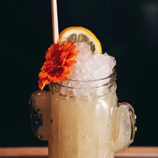 a drink in a mason jar