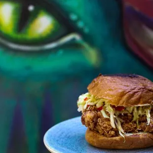 a fried chicken sandwich on a plate