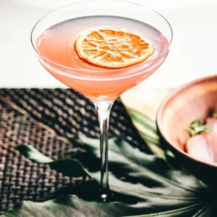 a cocktail in a coupe glass