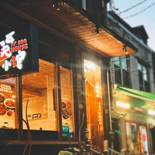 a bicycle parked in front of a restaurant
