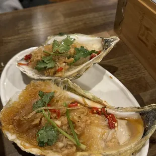 two oysters on a plate