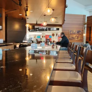 a man standing at the bar