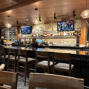 a man sitting at a bar