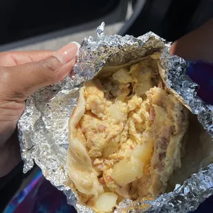 Bacon, potato and egg taco w/ NO bacon but bacon bits