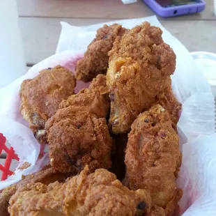 Hot wings were over fried, I think because they were cooked and re-cooked.   Looks nicely fried in the pic though.