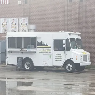 a food truck parked in a parking lot