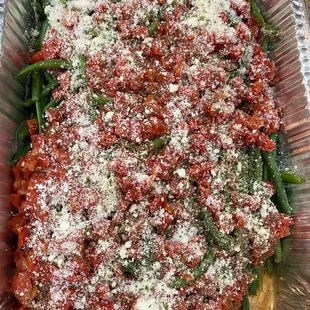 Green beans with homemade tomato sauce and Parmesan cheese