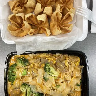 Crab rangoons and cheese noodles with beef