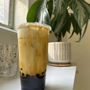 a cold drink in a plastic cup