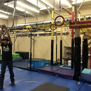 Inside the facility - Ninja obstacle HQ! This young boy who worked the party (Coach Cooper?) was super sweet to my son.