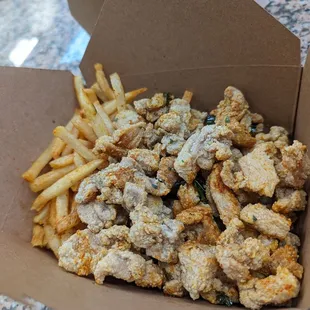 Spicy popcorn chicken and fries