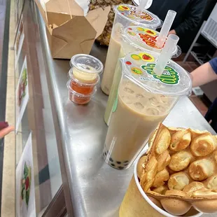 Egg waffle/bubble waffle. Popcorn chicken. Milk tea.