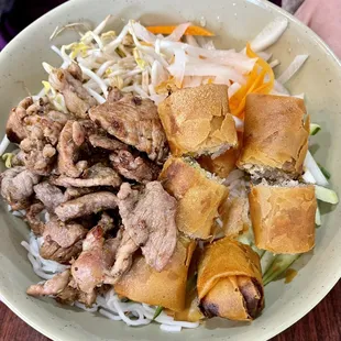 B4 pork, egg rolls, vegetables and rice noodles