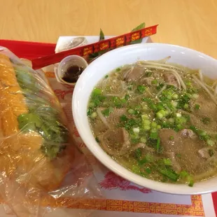 Beef pho and Banh Mi combo, one for now one for later.