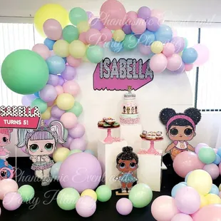 Rent our round wall backdrop. Adding a balloon Garland always makes it pop!