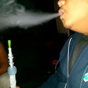 a man smoking a cigarette