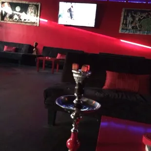 red walls and black couches