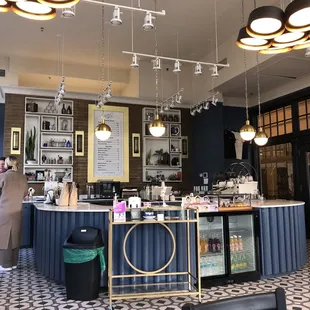 a woman standing at a counter