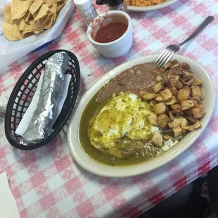 Huevos Enchilados (green sauce) and Enchiladas (chili gravy/fajita beef)