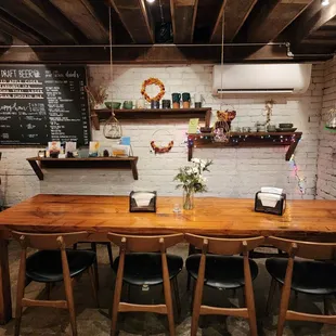 Seating area with cute wall and drinks!