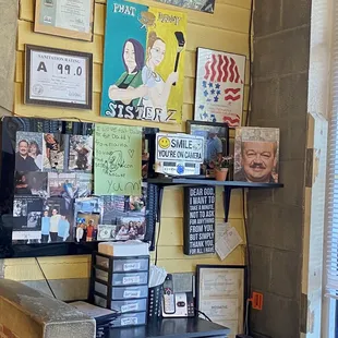 a wall full of posters