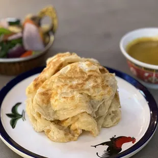 Roti canai with chicken curry for dipping