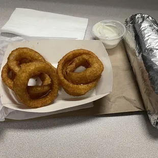 Full order of onion rings with 1 tiny ranch