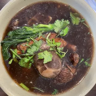 Black mushroom and duck noodle soup
