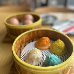 a variety of dumplings in a basket