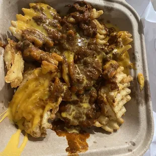 Basket of chili and cheese waffle fries