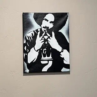 a black and white picture of a man with a cigarette