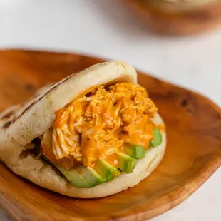 Daily made in house, KF yuca arepa pockets are filed with meats or veggies or both