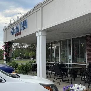 Shope front and outdoor seating.