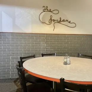 a table and chairs in a restaurant