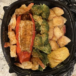 &quot;Mia&quot; platter w/ lobster tail, shrimp, potatoes, rice and corn